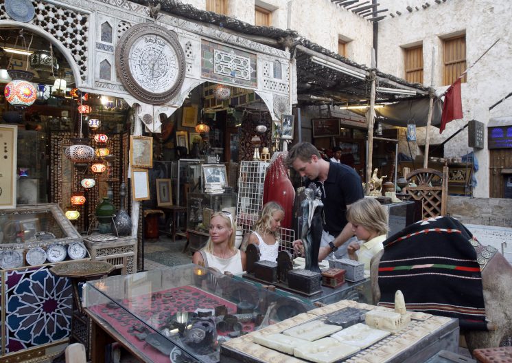 Foreigners buying crafts at Souq Wakif Doha Qatar